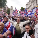 Cryptocoins, official merch and Elon Musk: How Tommy Robinson pulled off his biggest march yet